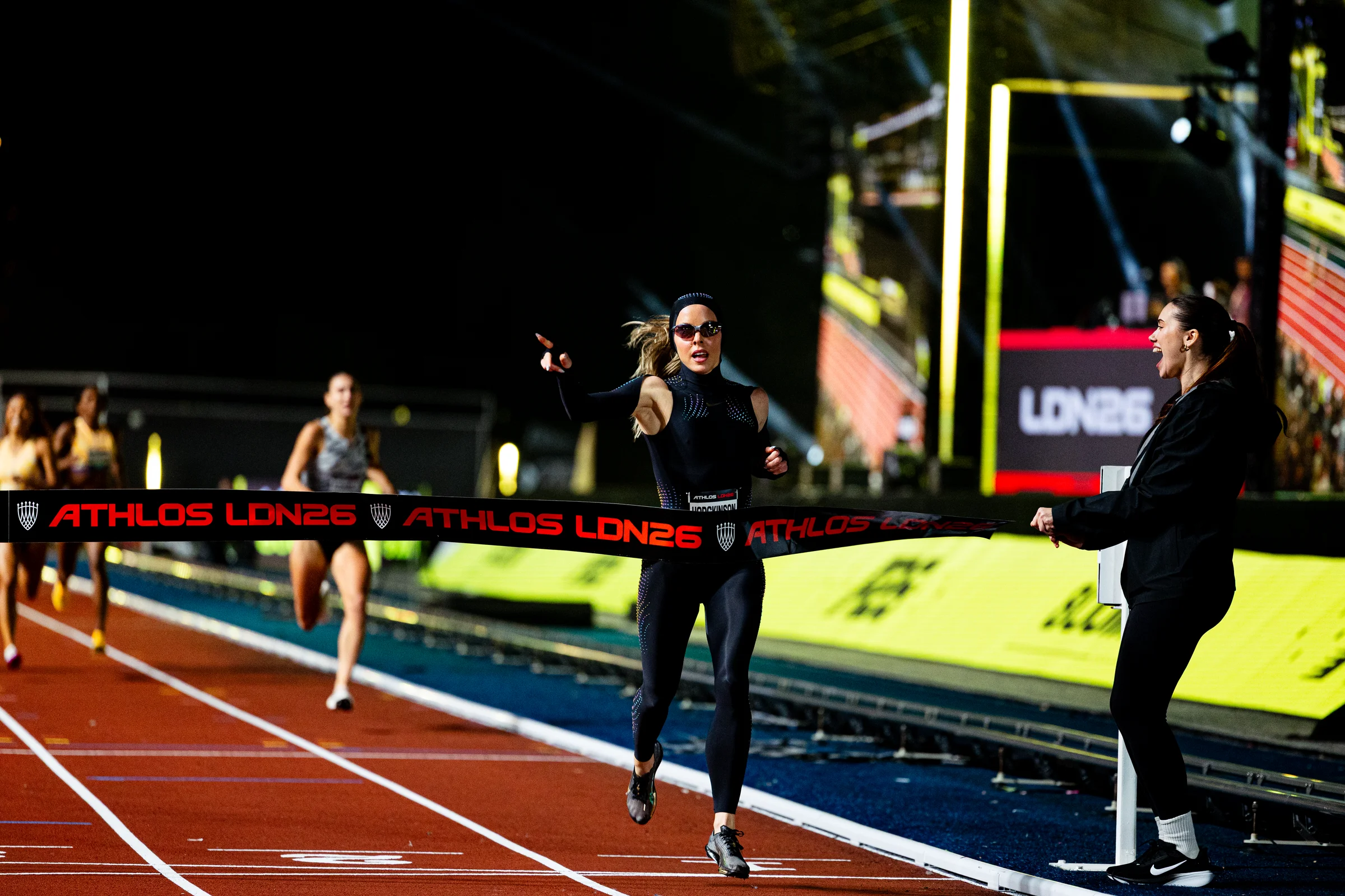 Keely Hodgkinson crossing the finish line at ATHLOS London 2026
